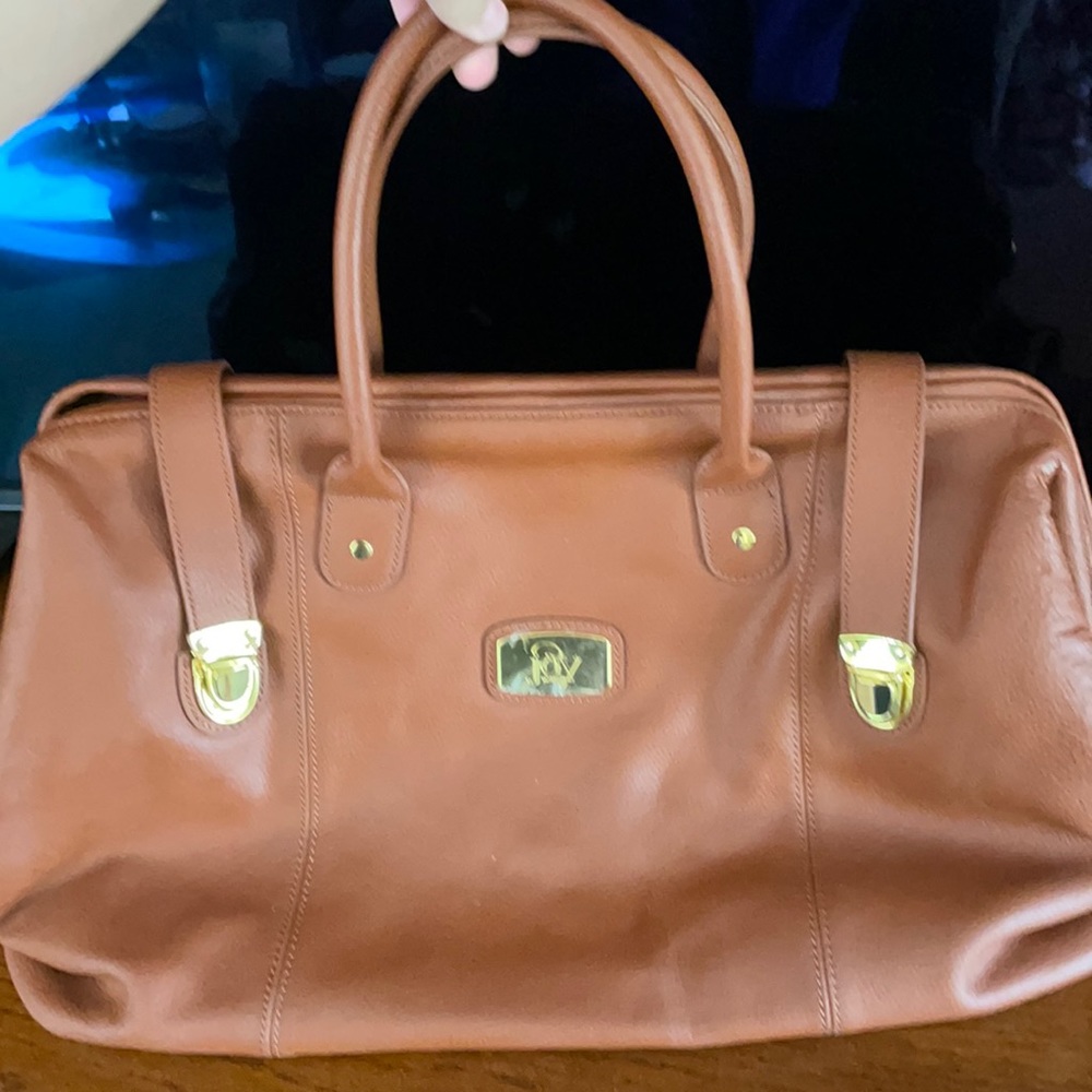 Tan Joy and Iman overnight bag with sunglass case